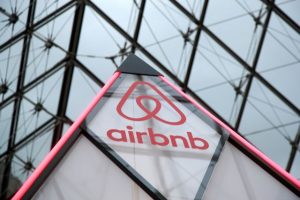 FILE PHOTO: Airbnb logo is seen on a little mini pyramid under the glass Pyramid of the Louvre museum in Paris - TA NEA - TA NEA