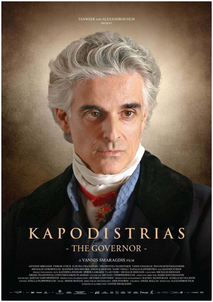 Poster for the film Kapodistrias – The Governor, featuring a stern, gray-haired man in 19th‑century attire against a brown gradient background.